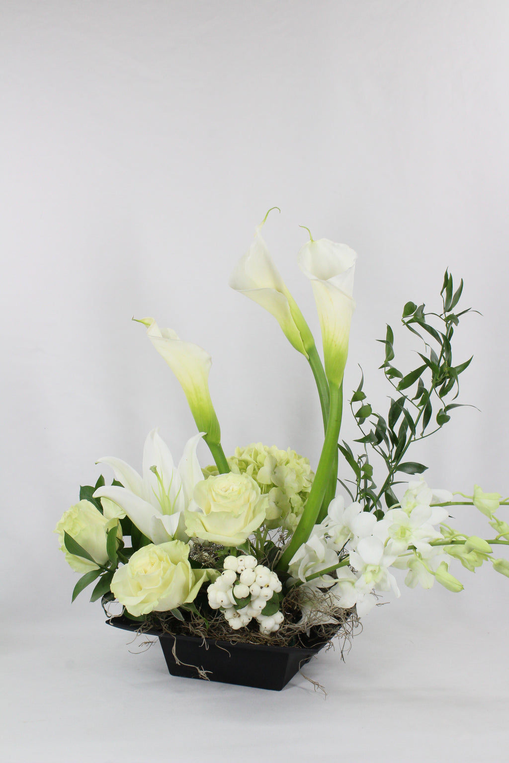 Lilies, callas and white roses Arrangement for Urn