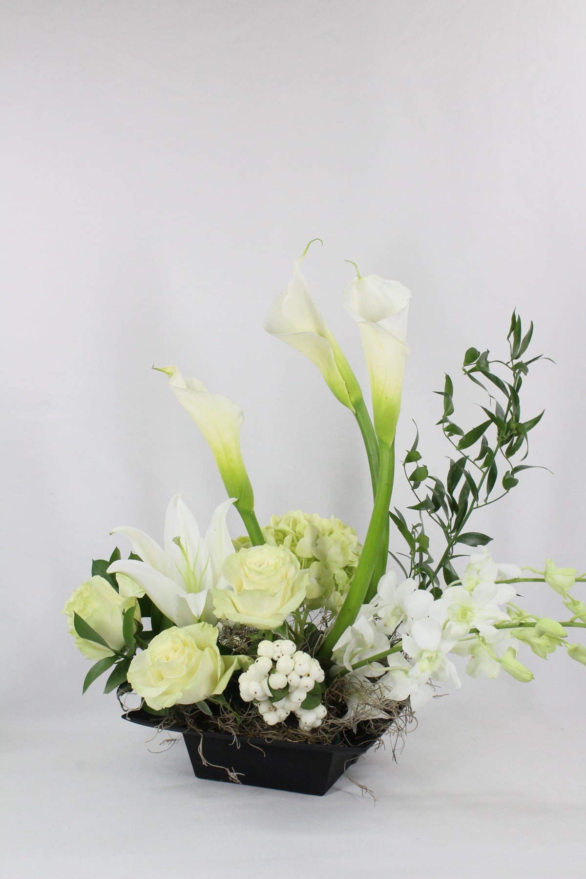 Lilies, callas and white roses Arrangement for Urn