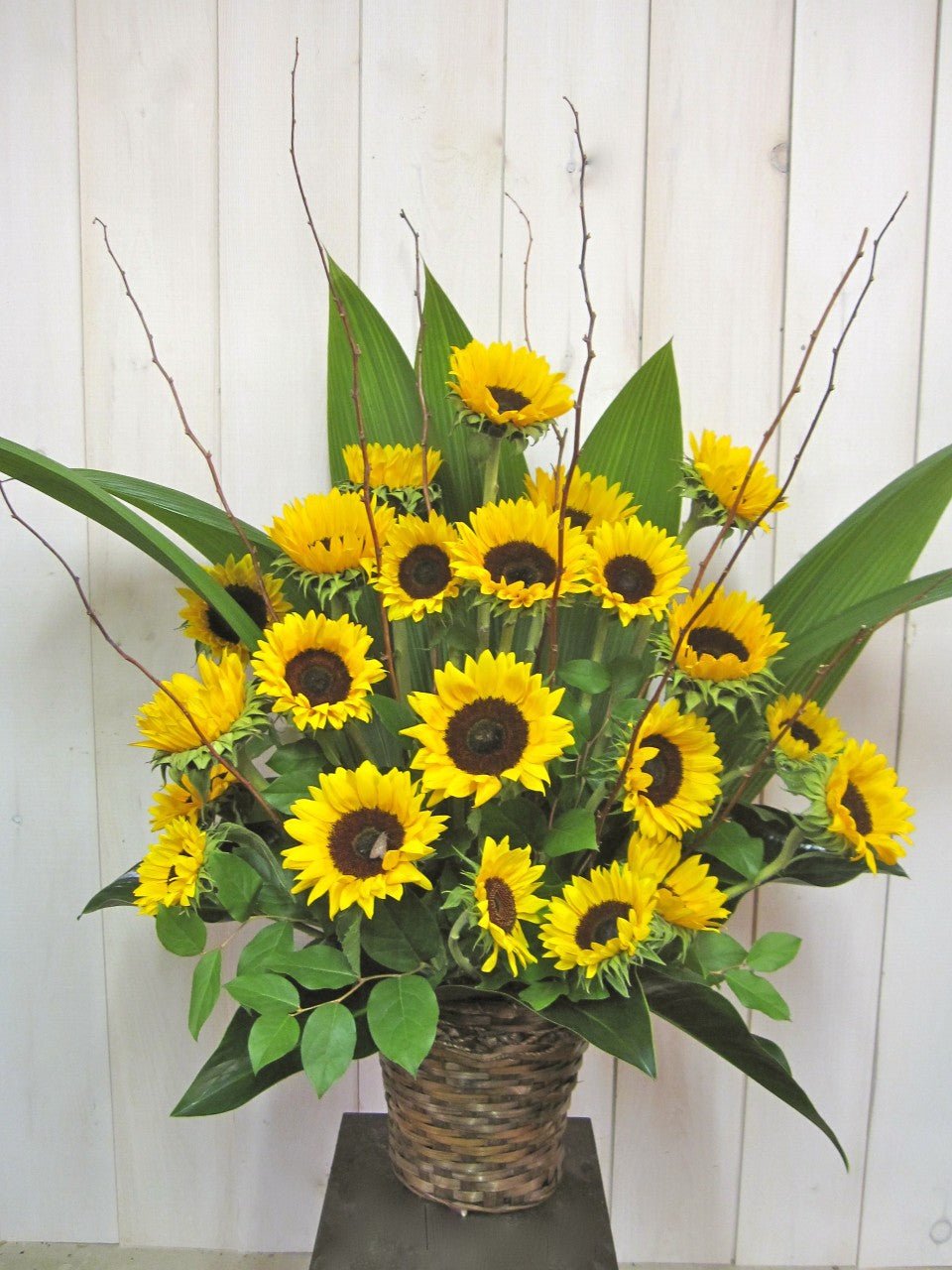 Composition de fleurs de Tournesols - Fleuriste Abaca