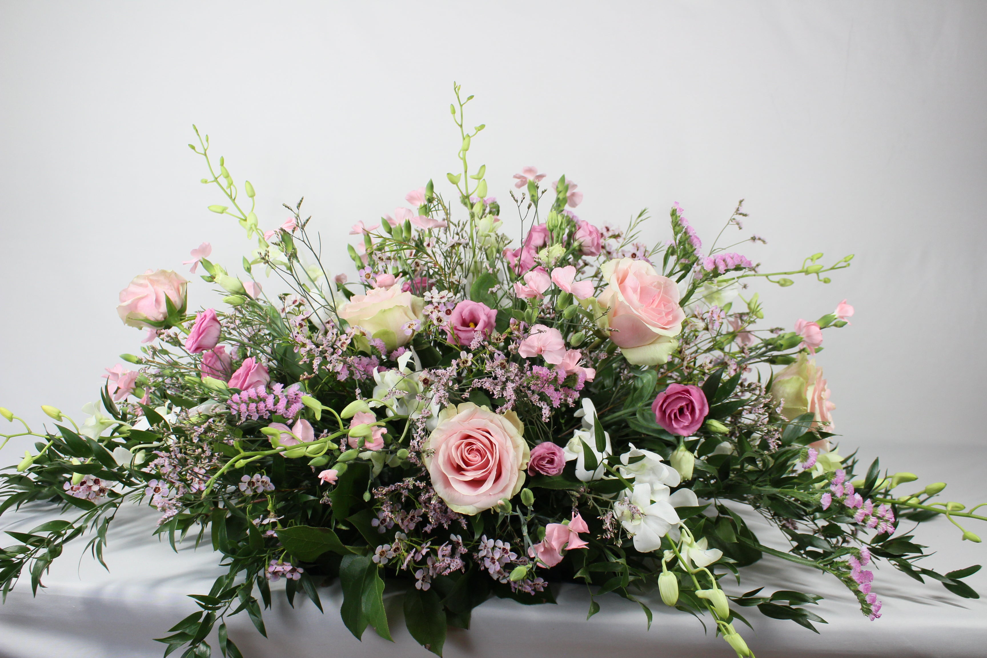 Coussin de fleurs pour cercueil Tout rose - Fleuriste Abaca