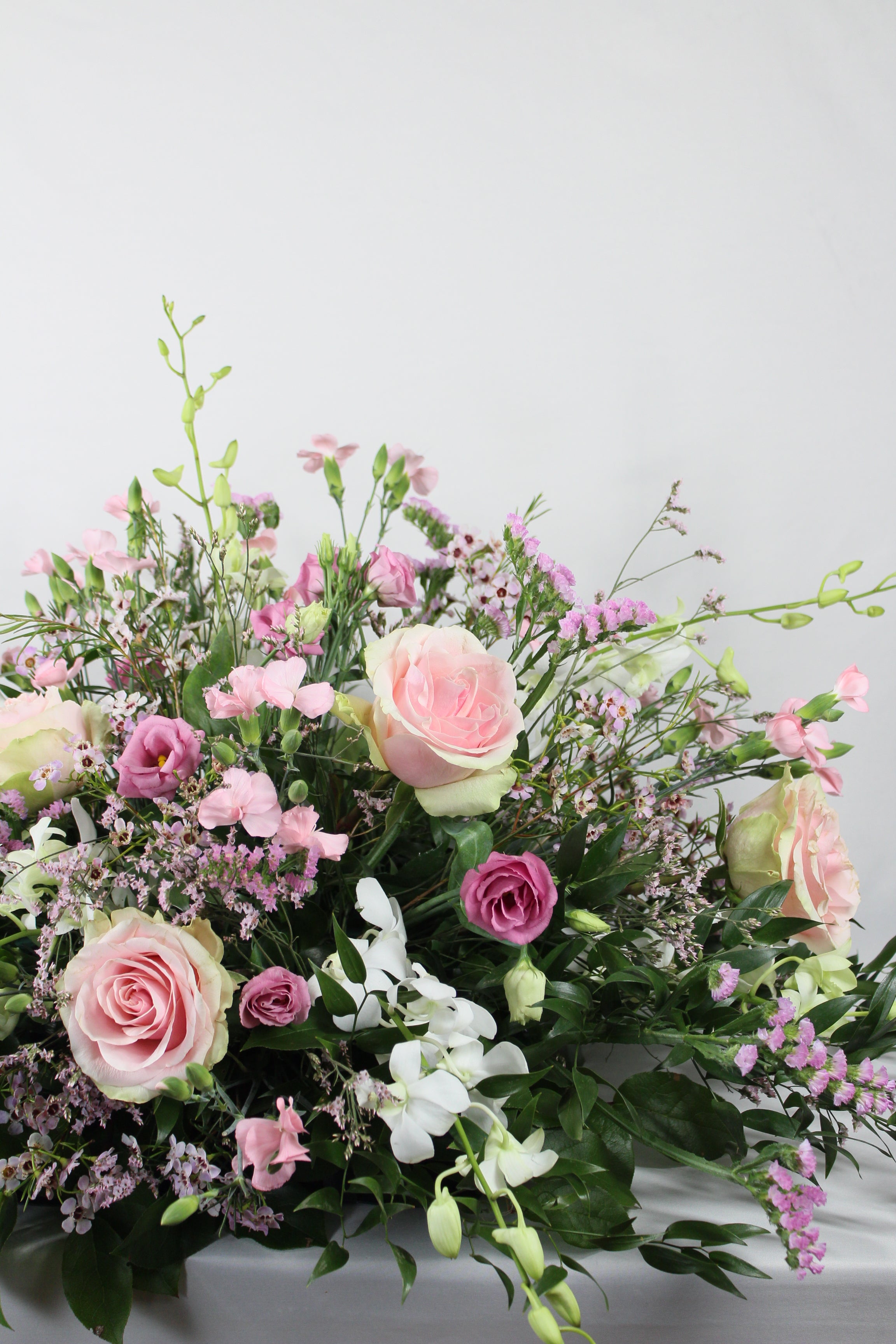Coussin de fleurs pour cercueil Tout rose - Fleuriste Abaca